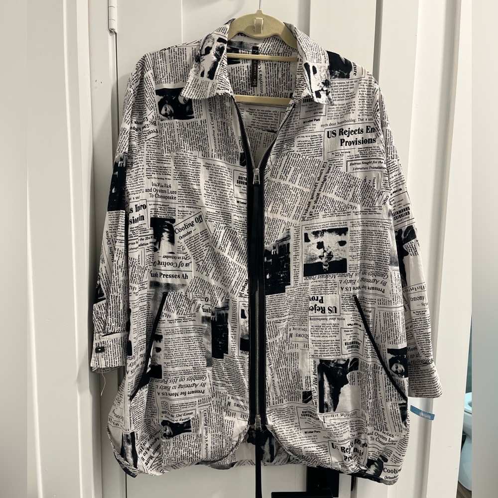 IC by ConnieK Newspaper Jacket